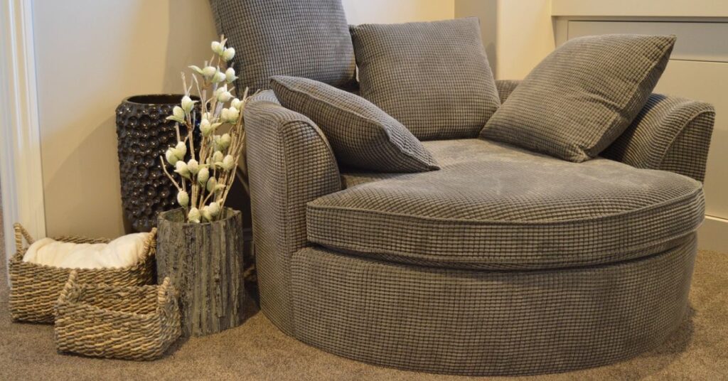 A round sofa featuring elegant design and comfortable seating.